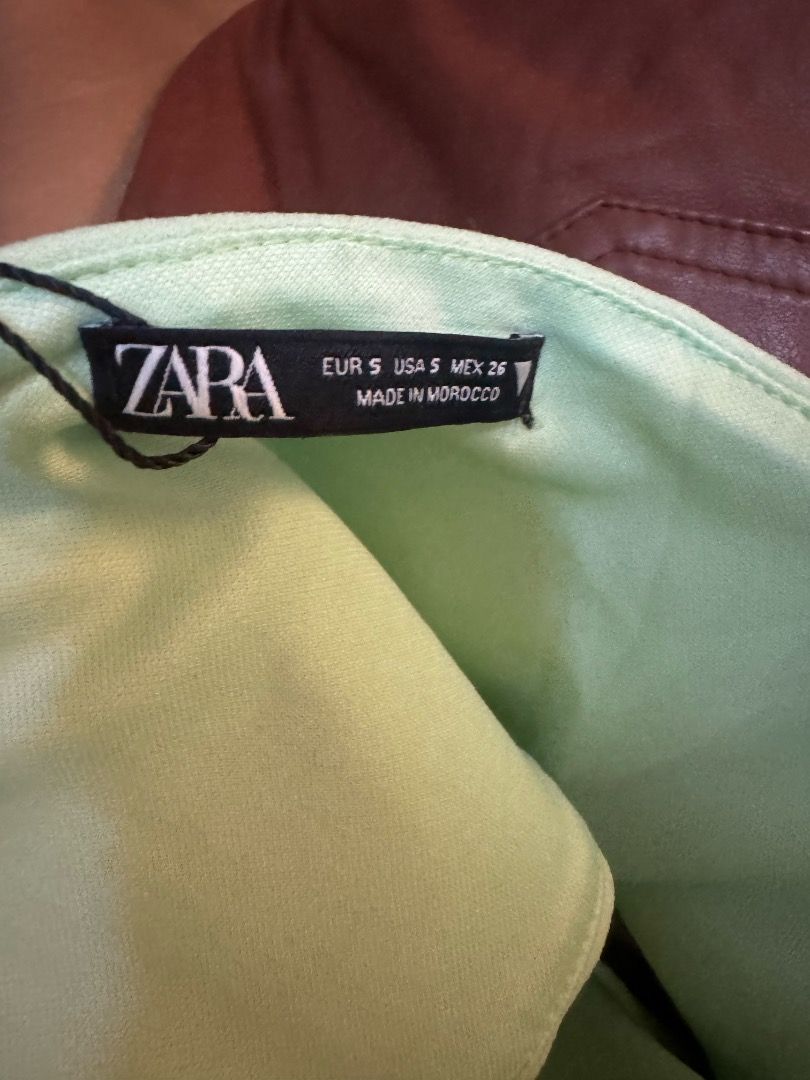 ZARA Light Green Corset Top (Category: Others Tops) located in Manila. Submitted by missalmon (Listing ID 1461256465, Image 3). Description: L: 7.5 inches W: 13.5 inches Adjustable Spaghetti Strap Zipper on side Issue on strap (See pic).