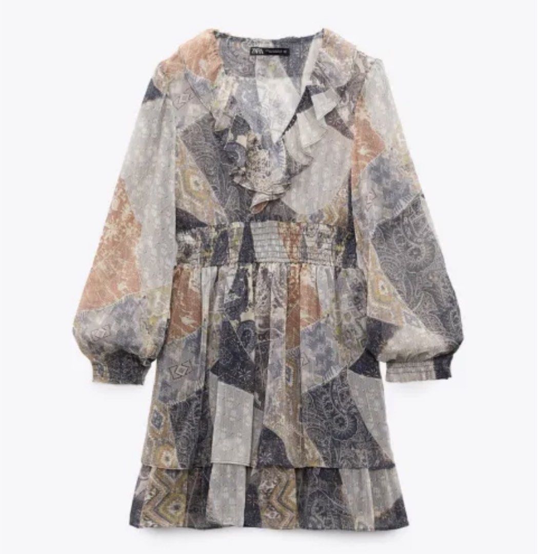 ZARA Patchwork Print Ruffle Dress (Category: Dresses) located in Taguig. Submitted by PF910 (Listing ID 1461311178, Image 2). Description: - Zara dress with a unique patchwork print - Features a romantic ruffled neckline - Stylish long balloon sleeves - Flattering smocked waist for a defined silhouette - Elegant tiered hemline - Made from sheer fabric with a subtle shimmer - Ideal for a night out or a special occasion.