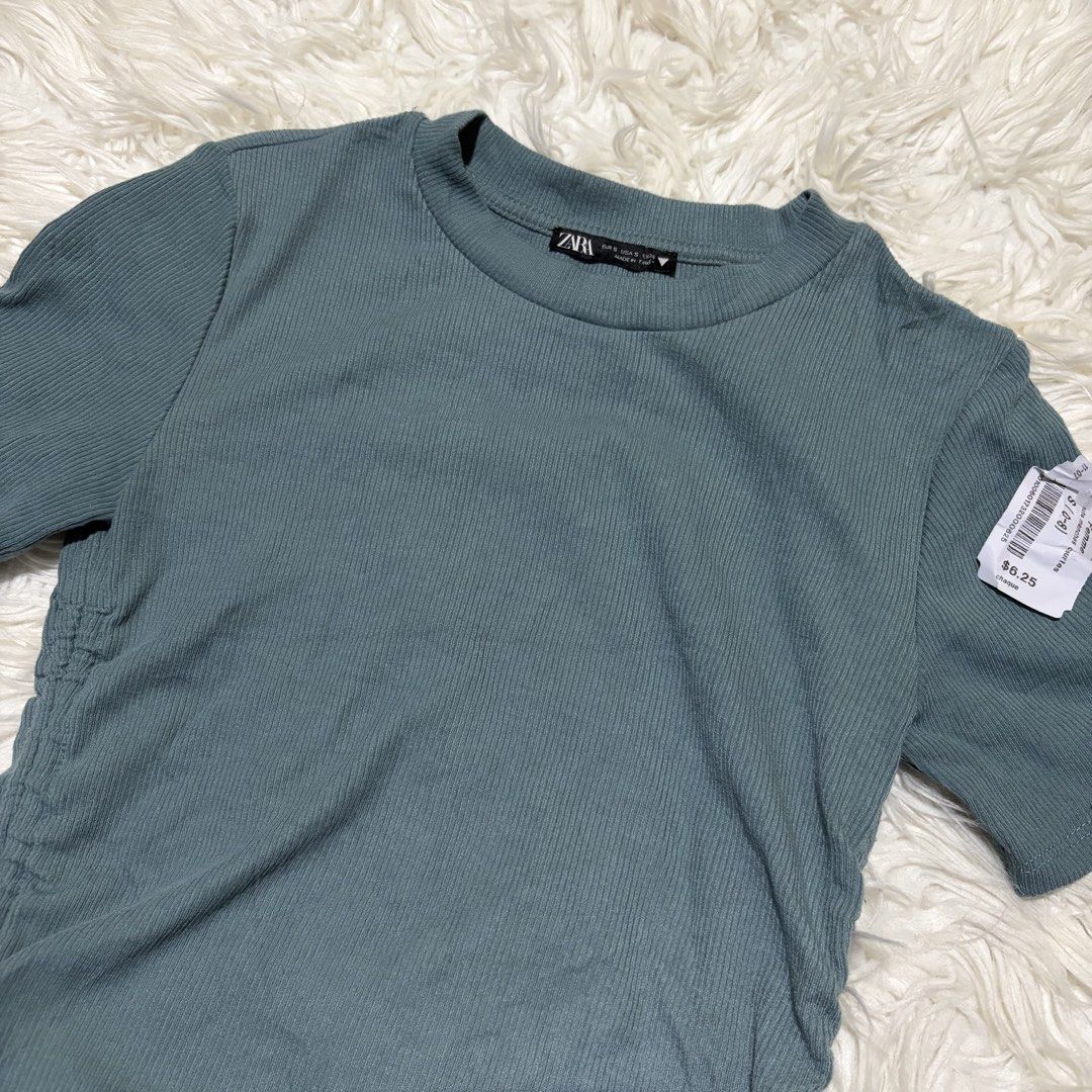 Zara Ribbed Ruched Drawstring T-shirt (Category: Shirts) located in Davao. Submitted by elizzadiac (Listing ID 1461229218, Image 2). Description: - Zara green ribbed t-shirt - Short sleeves, crew neck - Ruching and drawstring details on sides for adjustable fit - Size S - Ideal for casual wear.