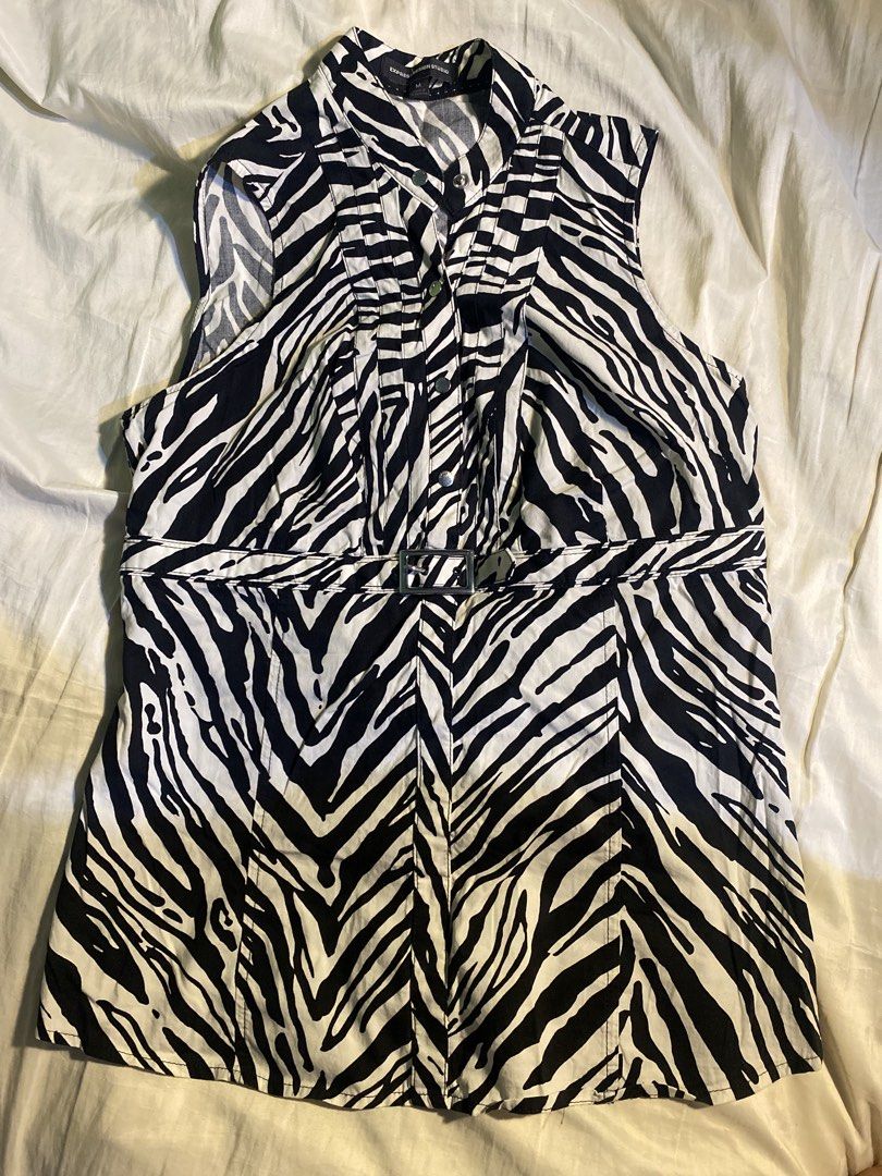 zebra prints top (Category: Sleeveless) located in Pasig City. Submitted by fionithrifts (Listing ID 1461282836, Image 1). Description: size xs- m.