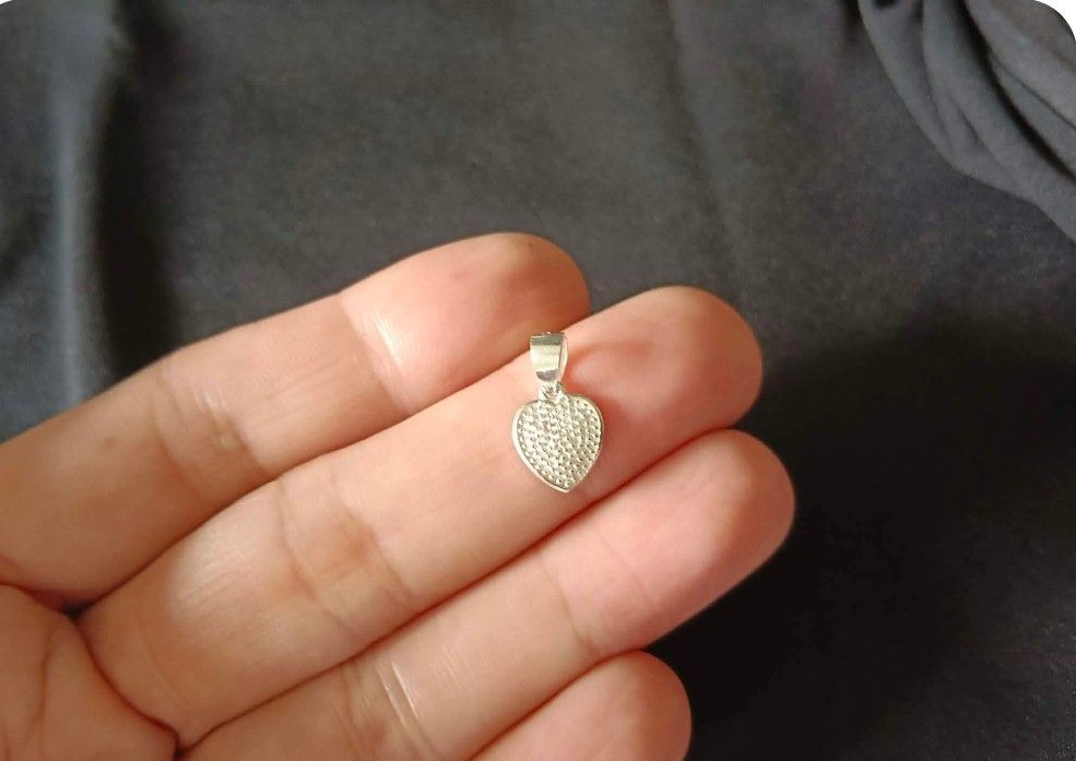 100% Legit 925 Silver Heart Pendant with FREE Stainless Steel Necklace (Category: Charms) located in Manila. Submitted by mhar_declutter (Listing ID 1427233827, Image 3). Description: 100% Legit Genuine 925 Silver Heart Pendant with FREE Stainless Steel Necklace.