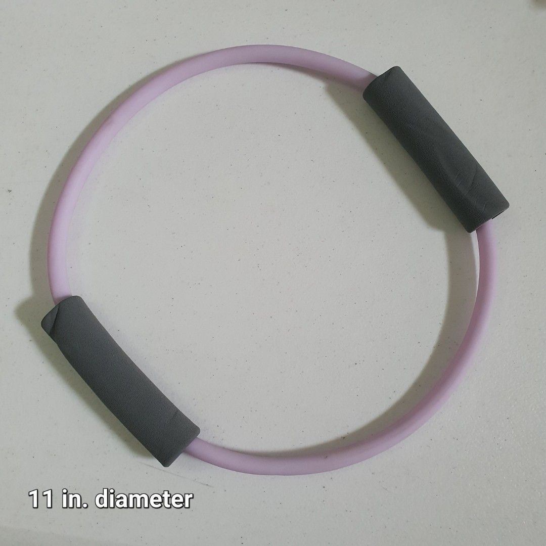 11 Inch Pilates Ring with Foam Handles (Category: Toning & Stretching Accessories) located in Paranaque City. Submitted by cobien (Listing ID 1461408897, Image 1). Description: - Light purple Pilates ring - 11 inches in diameter - Includes two grey foam handles for enhanced grip - Ideal for toning and stretching exercises - Convenient for home workouts - Easy to store and transport.