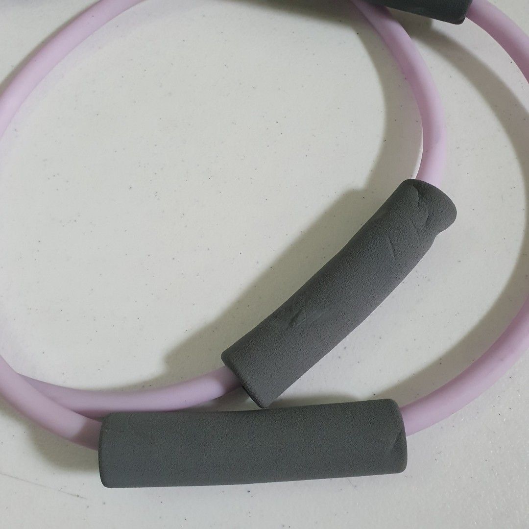 11 Inch Pilates Ring with Foam Handles (Category: Toning & Stretching Accessories) located in Paranaque City. Submitted by cobien (Listing ID 1461408897, Image 3). Description: - Light purple Pilates ring - 11 inches in diameter - Includes two grey foam handles for enhanced grip - Ideal for toning and stretching exercises - Convenient for home workouts - Easy to store and transport.