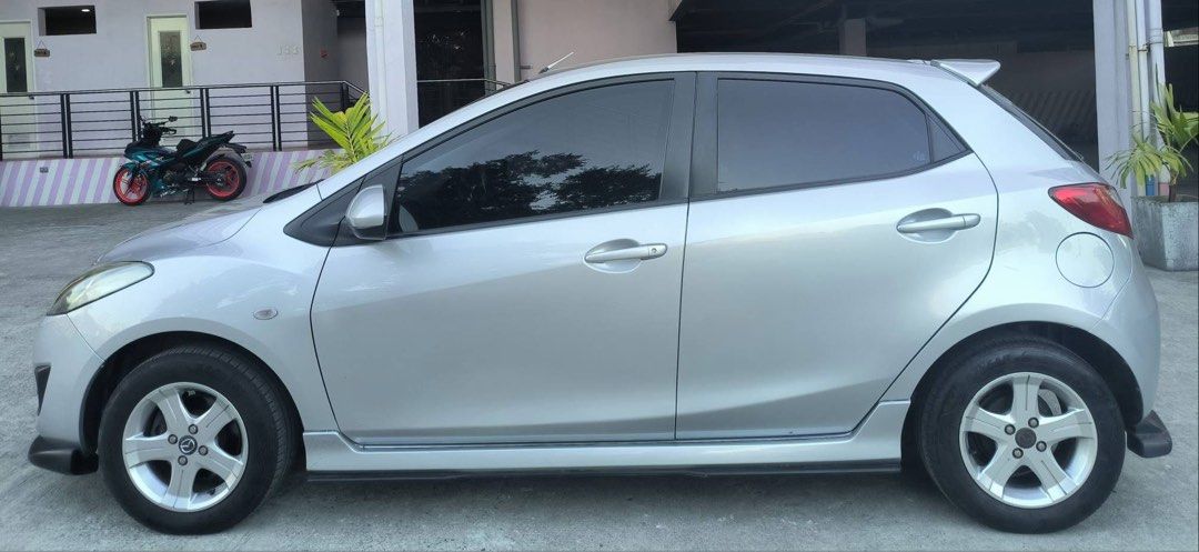 Mazda 2 1.3 Hatchback Manual (Category: Used Cars) located in Manila. Submitted by tekz27 (Listing ID 1461341147, Image 3). Description: first owner[lady owned] insured running good conditions yearly pms updated legal documents all genuine stock parts minor dents its normal because ur buying is a 2nd hand. negotiable upon viewing contact me here if u are interested for faster transaction. .