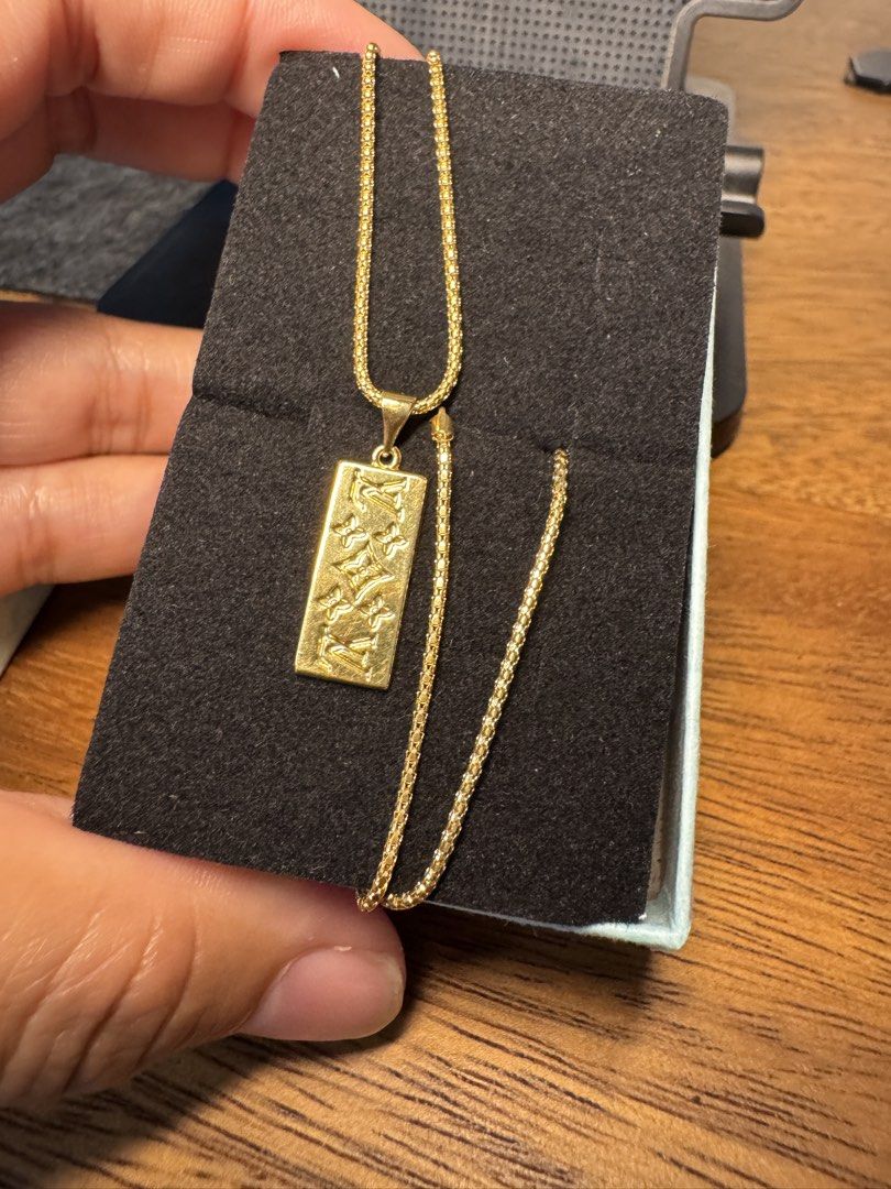 18K Gold Chain Necklace with Rectangle Pendant (Category: Necklaces) located in Paranaque City. Submitted by kenoh07 (Listing ID 1461523063, Image 2). Description: - Solid 18K Gold (stamped '750') - Selling this as per piece - Elegant box chain - Rectangular bar pendant with embossed pattern - Secure spring ring clasp - 19.5 inches - pendant is open back.