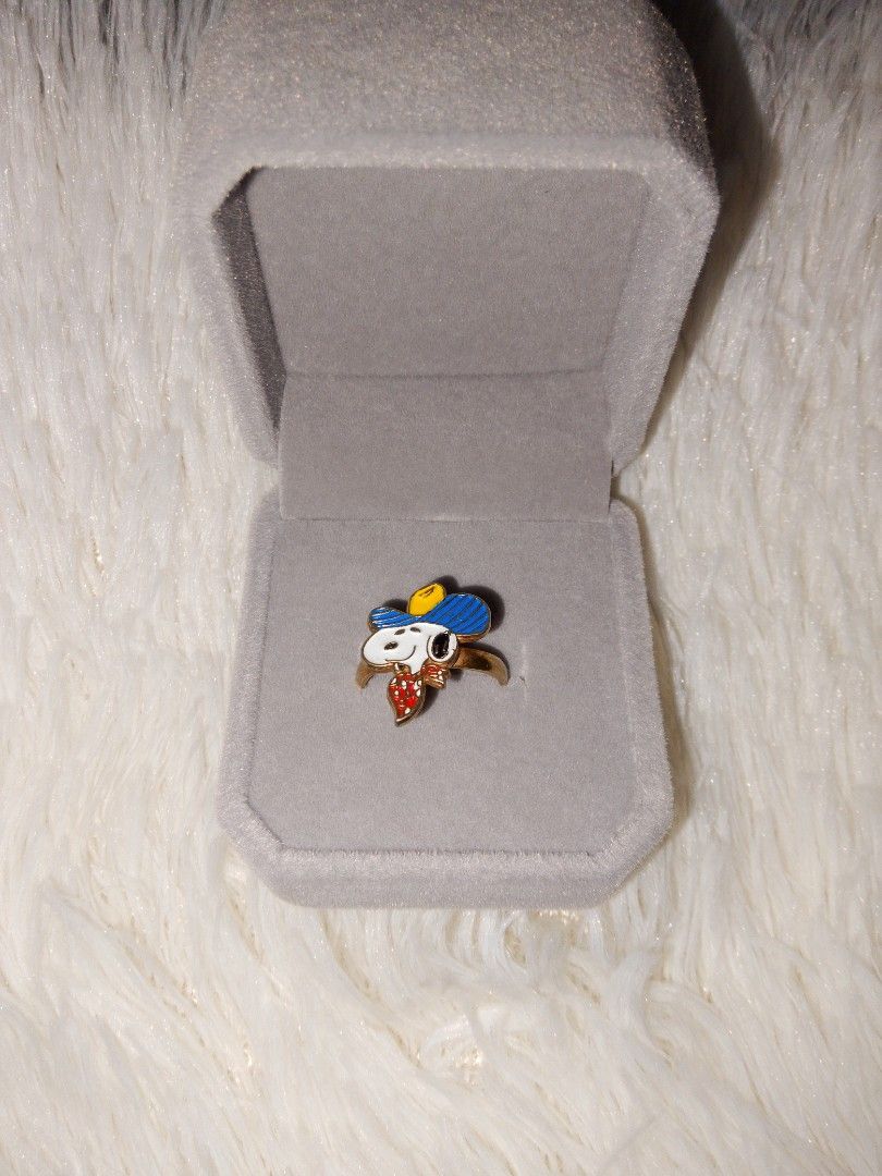1970s aviva snoopy cowboy ring (Category: Vintage Collectibles) located in Manila. Submitted by jym008 (Listing ID 1461339196, Image 2). Description: Vintage 1970s Aviva Snoopy Cowboy Ring 🤠 Original enamel, no crack / no chip Adjustable size, gold-tone Ring only + box Origin: Japan (Aviva USA 70s) ₱900 - GCash / J&T / Lalamove PM lang!.