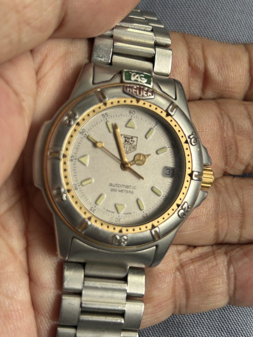 1990s Tagheuer Professional Automatic diver watch (Category: Luxury Watches) located in Caloocan City. Submitted by guitara1822 (Listing ID 1461387317, Image 2). Description: MANUFACTURER: Tag Heuer MODEL: Automatic Diver 4000 REFERENCE: 695.706K YEAR: 1990’s CASE: The stainless steel case measures 38mm in diameter. In typical diver fashion it features a rotating bezel which is in good condition. Both the bezel and the case present with minor wea