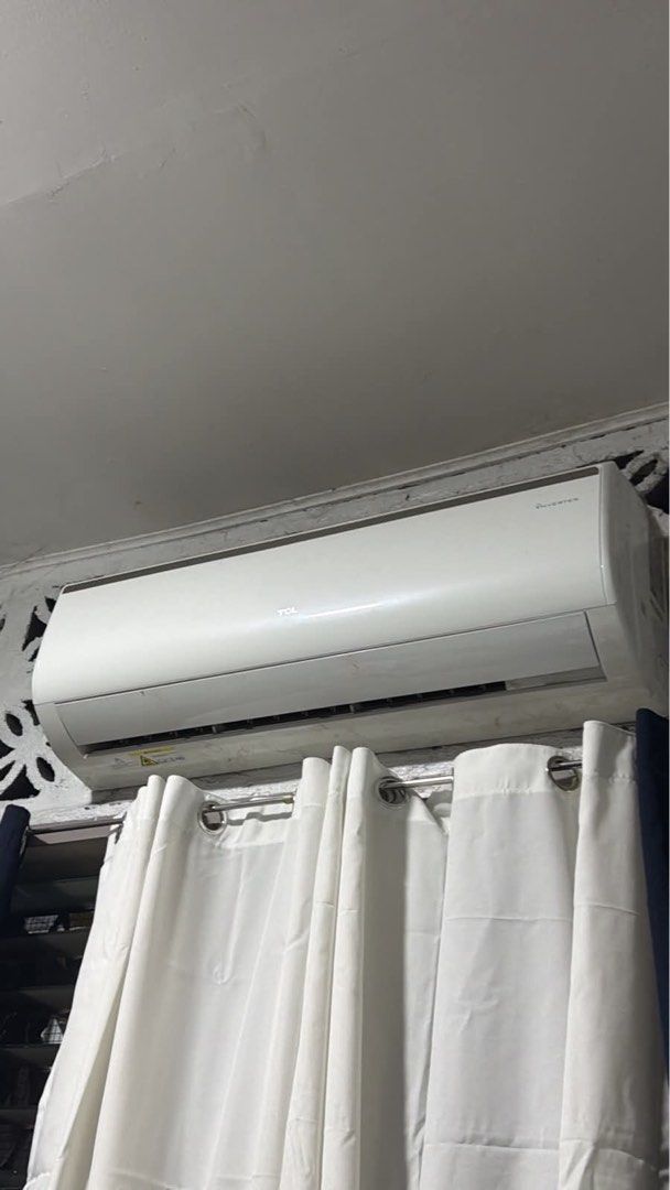 2.5HP TCL Inverter Air Conditioner (Category: Air Conditioning and Heating) located in Manila. Submitted by rich028 (Listing ID 1461473900, Image 1). Description: - TCL Inverter Air Conditioner - White unit, already mounted - Effectively cools down rooms - Works well - White curtains are currently in front of the unit.
