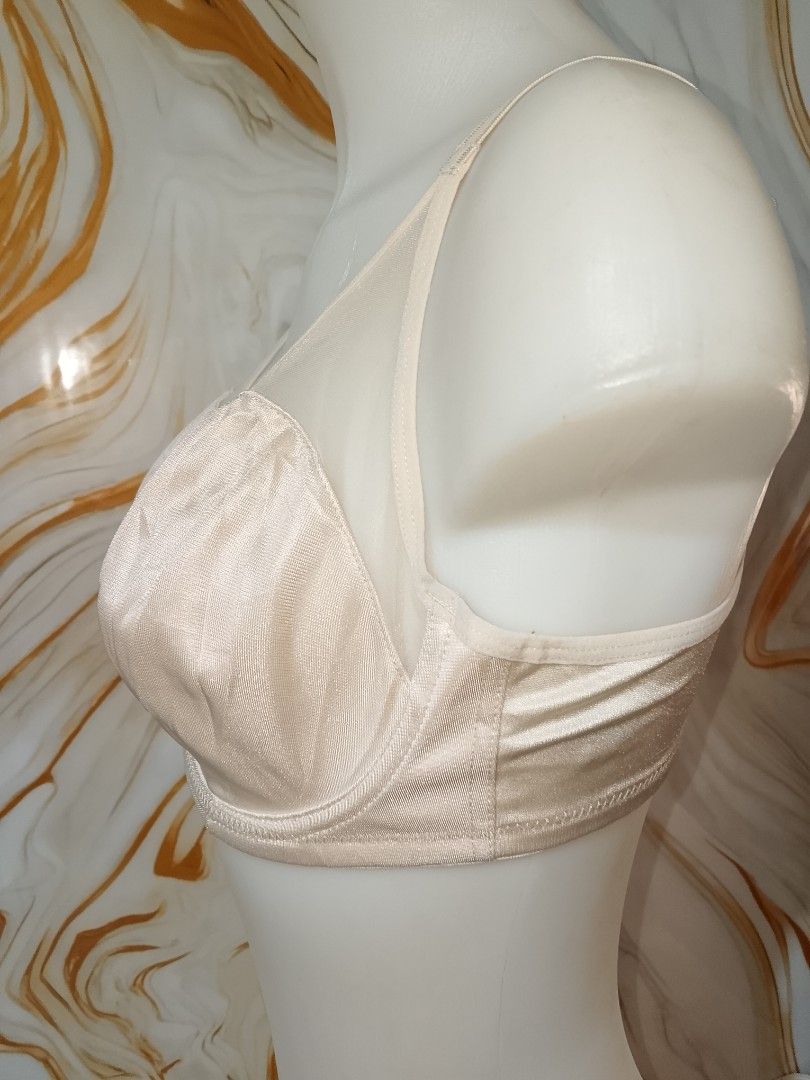 38b rojan Cream Satin Full Coverage Bra no pads with underwire (Category: Undergarments & Loungewear) located in Manila. Submitted by truecrystal-1407 (Listing ID 1461545079, Image 2). Description: - Cream colored bra - Satin cups with sheer mesh overlay - Adjustable straps - Hook-and-eye closure at the back - Small bow detail in the center - Comfortable full coverage style.
