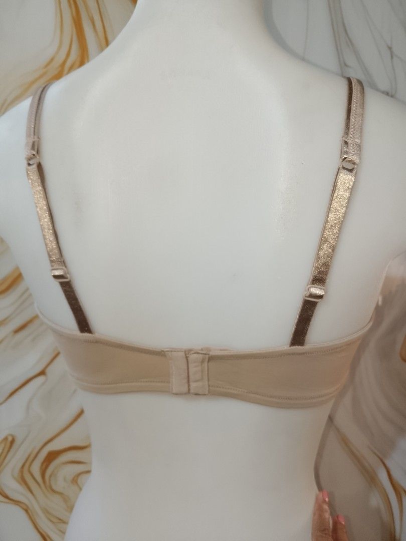 38d OLGA Beige Bra no pads with underwire (Category: Undergarments & Loungewear) located in Manila. Submitted by truecrystal-1407 (Listing ID 1461346586, Image 3). Description: - Chic beige bra with elegant gold strap details. - Adjustable straps for a customized, comfortable fit. - Secure hook-and-eye closure at the back. - Designed for everyday comfort and excellent support. - A versatile piece that easily pairs with various outfits..
