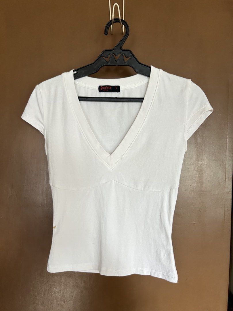 90s Inspired V Neck White Top (Category: Shirts) located in Manila. Submitted by anothermanxtreasure (Listing ID 1461398871, Image 1). Description: Good for a capsule wardrobe Cute cap sleeve detail, dainty + sexy Reminds me of Carolyn Bessette Has a small brown stain on the side (zoom in).