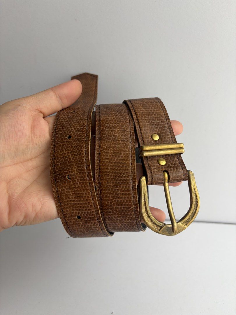 9. Brown Leather Belt 50 (Category: Belts) located in Quezon City. Submitted by wagwagan_ukay_blues (Listing ID 1461473765, Image 2). Description: From Japan In good condition ❗️please expect signs of usage Hole size - 23”-27” Width -1.1” Overall - 30”.