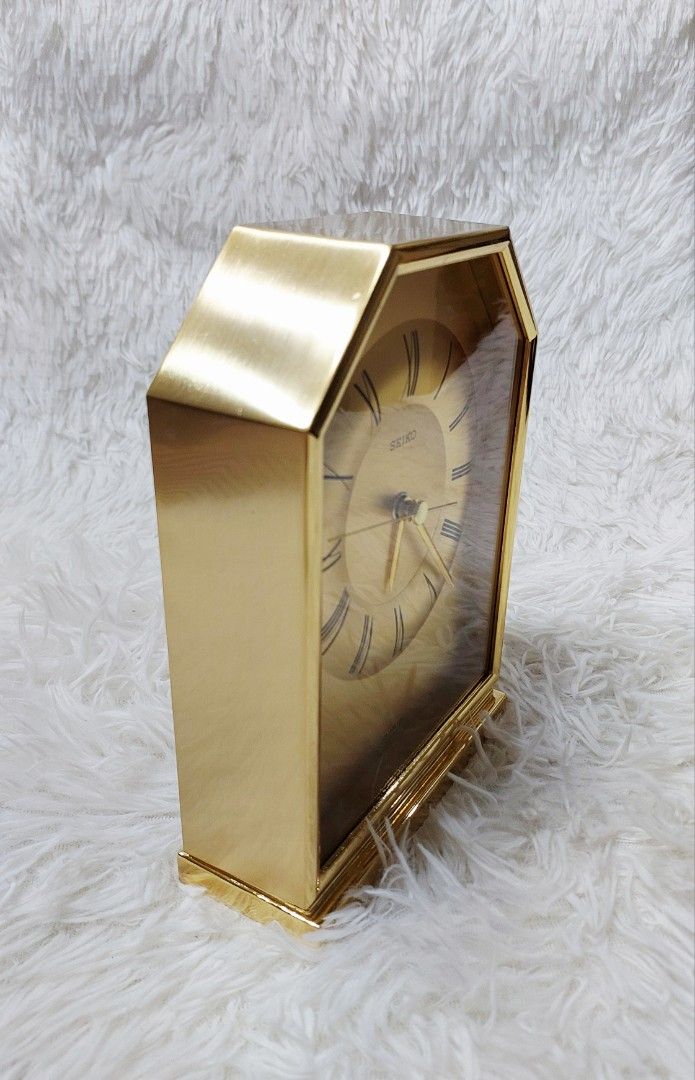 🕰️ Seiko Classic Gold-Tone Table Clock (Category: Clocks) located in Binan City. Submitted by sakuratreasuresph (Listing ID 1461390863, Image 3). Description: 🕰️ Seiko Classic Gold-Tone Table Clock Add a touch of classic charm to your space with this beautiful Seiko table clock. Its warm gold-tone finish, octagonal frame, and striking Roman numeral dial create a refined look that stands out on a desk, shelf, or display cabinet. ✨ Seiko branded 
