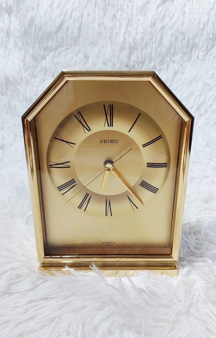 🕰️ Seiko Classic Gold-Tone Table Clock (Category: Clocks) located in Binan City. Submitted by sakuratreasuresph (Listing ID 1461390863, Image 2). Description: 🕰️ Seiko Classic Gold-Tone Table Clock Add a touch of classic charm to your space with this beautiful Seiko table clock. Its warm gold-tone finish, octagonal frame, and striking Roman numeral dial create a refined look that stands out on a desk, shelf, or display cabinet. ✨ Seiko branded 