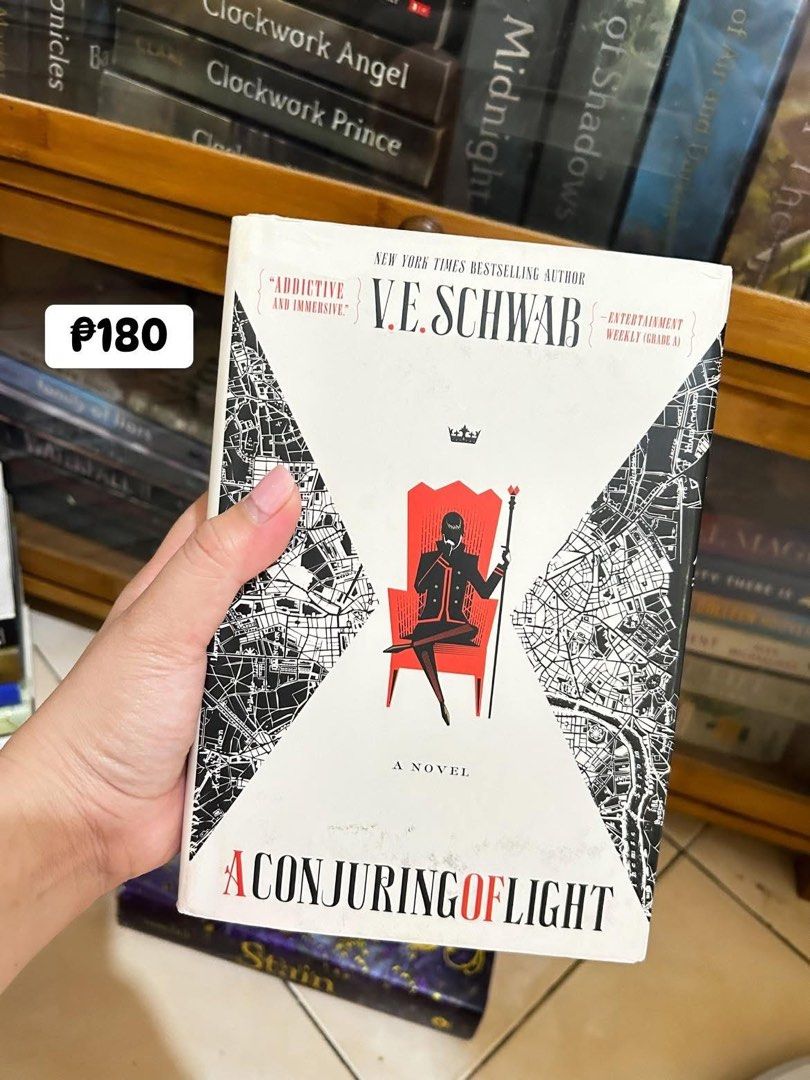 A Conjuring of Light by V.E. Schwab (Category: Storybooks) located in Santa Maria. Submitted by looksbylou (Listing ID 1461520615, Image 1). Description: - A Conjuring of Light novel by V.E. Schwab - New York Times bestselling author - "Addictive and immersive" - Entertainment Weekly - Perfect for fantasy fans - Selling for P180 -Meet ups at Sta Maria, Bulacan. SM North or Trinoma by schedule but payment first. -Shipping via J&T or Lalamove.