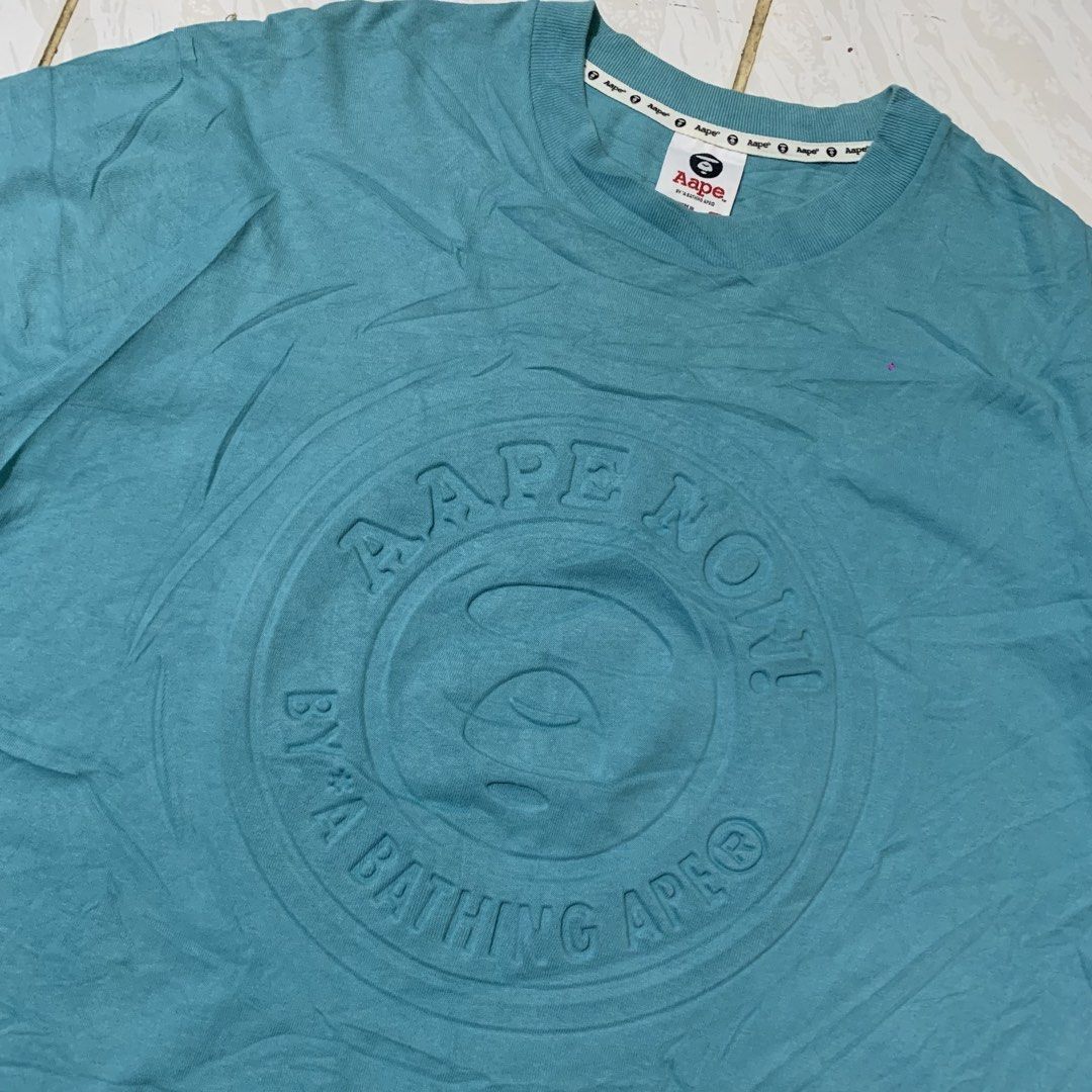 Aape Embossed Logo Tee (Category: Tshirts & Polo Shirts ) located in Cebu City. Submitted by johnferrer96412 (Listing ID 1461545878, Image 2). Description: Aape Embossed Logo Tee Small fit Medium to L Width 21 Length 27 Excellent condition Dm📩.