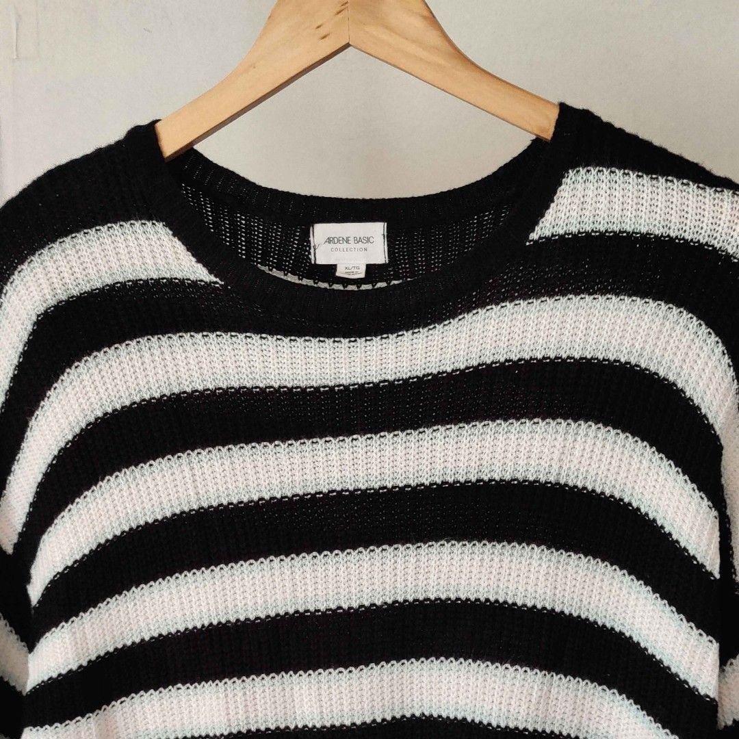 ABILENE BASIC COLLECTION Black and White Striped Sweater (Category: Longsleeves) located in Manila. Submitted by swishyyy (Listing ID 1461324998, Image 2). Description: ⁠ー price negotiable 🏷️ - Black and white striped knit sweater - Brand: Abilene Basic Collection - Style: Long sleeves, crew neck - Fit: Relaxed - Material: Soft knit - Versatile: Perfect for layering or wearing alone - Easy to style with jeans or skirts.