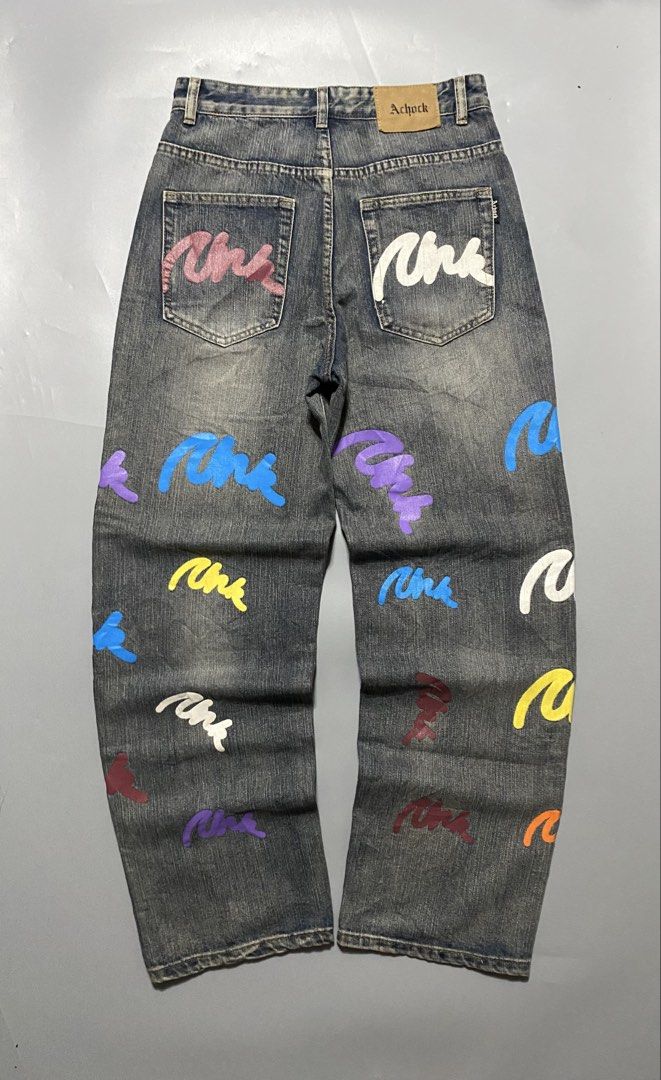AChock Denim Jeans with Graffiti Print (Category: Jeans) located in Manila. Submitted by delunakenn94368 (Listing ID 1461537249, Image 1). Description: - Brand: AChuck - Style: Distressed Denim Jeans - Design: All-over graffiti print - Fit: Baggy - Vibe: Streetwear - Occasion: Casual wear.