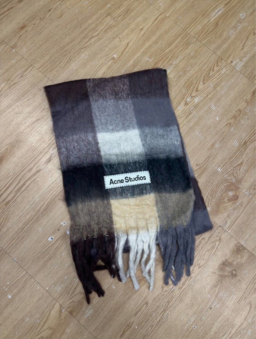 Acne Studios Scarf (Category: Luxury Accessories) located in Manila. Submitted by tindero-ng-damit (Listing ID 1461514040, Image 1). Description: Name: Acne Studios Mohair Check Scarf Color: Choco Brown No issues - flawless Complete tags 🏷️.
