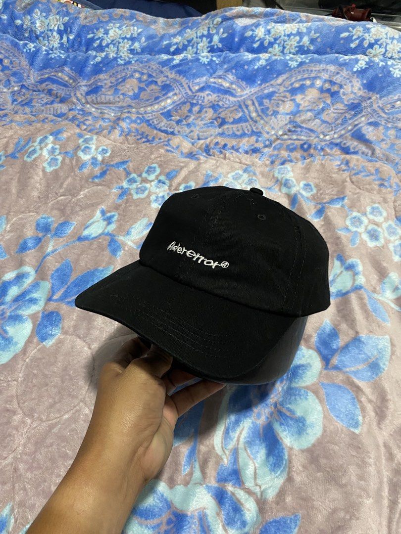 Ader Error Black Cap (Category: Caps & Hats) located in Polomolok. Submitted by marrssz (Listing ID 1461392723, Image 1). Description: - Brand: Ader Error - Color: Black - Season: 2020 Spring Summer - Material: 100% Cotton - Size: A1 - Design: Simple and classic - Perfect for: Everyday wear.