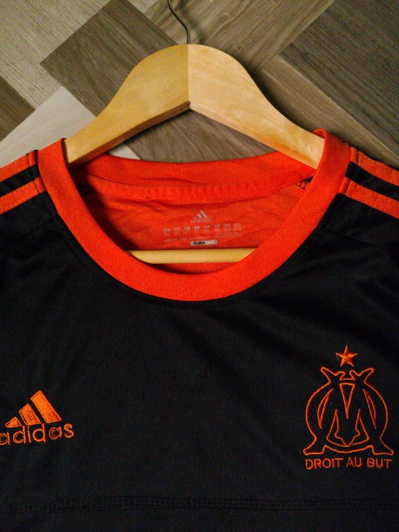 Adidas 2012-13 Olympique De Marseille (Category: Tshirts & Polo Shirts ) located in Caloocan City. Submitted by textyl_haven (Listing ID 1461547161, Image 2). Description: 💫 𝗔𝗗𝗜𝗗𝗔𝗦 𝟮𝟬𝟭𝟮-𝟭𝟯 𝗢𝗟𝗬𝗠𝗣𝗜𝗤𝗨𝗘 𝗗𝗘 𝗠𝗔𝗥𝗦𝗘𝗜𝗟𝗟𝗘 ✨ ♠️ 𝗜𝗧𝗘𝗠: • Dimes: 20" x 28" • Size: Medium • Condition: 8/10 (crackprints) • Declared as: HQR 📌 𝗡𝗢𝗧𝗘: • Item may vary due to lightning. • Manage your expectations, some items may have flaws/issu