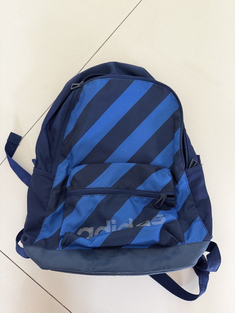 Adidas Backpack Blue Stripes (Category: Backpacks) located in Quezon City. Submitted by myriadtrinkets (Listing ID 1461407239, Image 1). Description: - Classic blue Adidas backpack - Iconic diagonal stripe design - Convenient front zip pocket - Large main compartment for ample storage - Adjustable straps for a customized fit - Ideal for school, work, or everyday adventures.