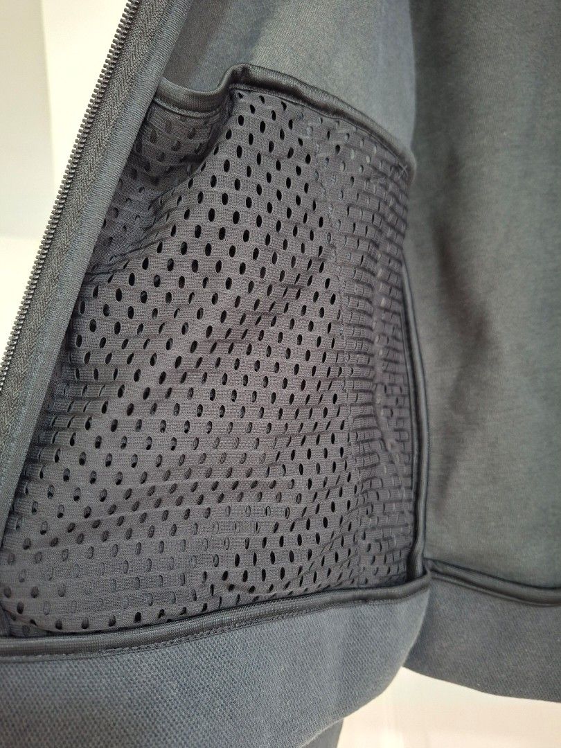 Adidas Black Zip-Up Hoodie (Category: Coats, Jackets and Outerwear) located in Pasig City. Submitted by avcan (Listing ID 1461396295, Image 3). Description: - Black Adidas zip-up hoodie - Features mesh detail inside - Tag quote: 'Sport is not just the game, play. Sport is who I am.' - Size: S - Made in Vietnam - Perfect for casual wear or sports activities.