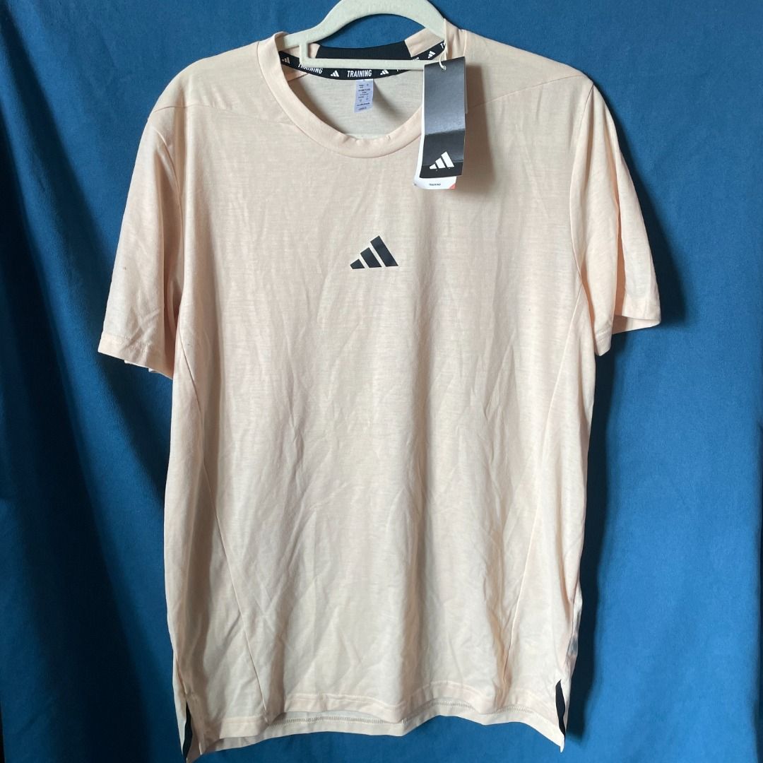 Adidas Designed for Training Workout Tee (Category: Activewear) located in Caloocan City. Submitted by heyheymareyyy (Listing ID 1461460277, Image 2). Description: selling 🫶 bought during the Adidas Warehouse Sale 2026 still have the original receipt :) Designed for Training Workout Tee size: MEDIUM color: Crystal Sand ₱850 only (orig price: ₱2k) 📍 makati city 🤝 meet-up available 📦 shipping available dm if interested 💌.
