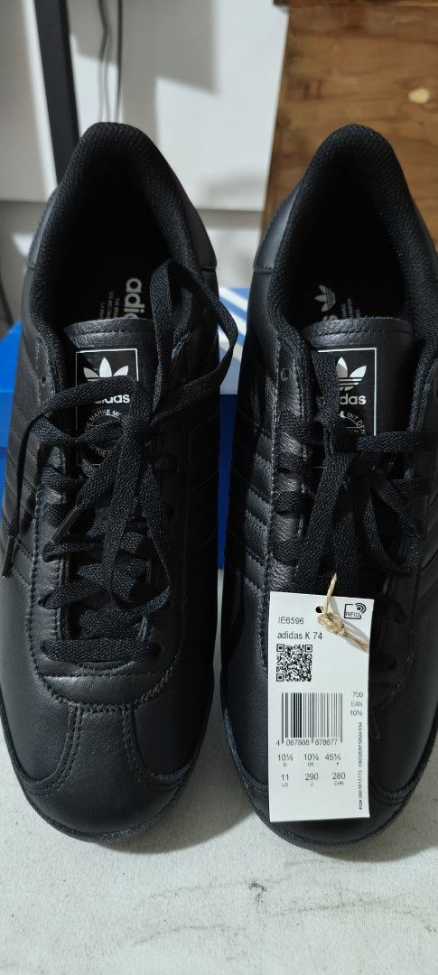 Black Sneakers Adidas K 74 (Category: Sneakers) located in Quezon City. Submitted by jtgabs (Listing ID 1461428776, Image 2). Description: - Adidas K 74 sneakers - Color: Black - Material: Leather upper - Size: US 11 - Includes original box and tags - Never used - RFS: Change of Mind.