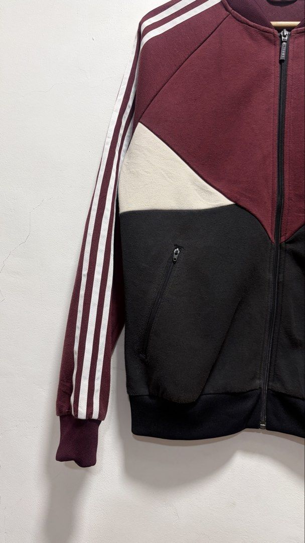 Adidas Maroon Track Jacket (Category: Coats, Jackets and Outerwear) located in Manila. Submitted by petlover777 (Listing ID 1461558091, Image 3). Description: Best fit to small to medium (20.5 x 25.5) EXCELLENT CONDITION! 🔥 may stain lang sa likod 📍Pick up location: Barangay 235 Hall Abad Santos Manila 🛵Delivery: J&t | Lalamove.