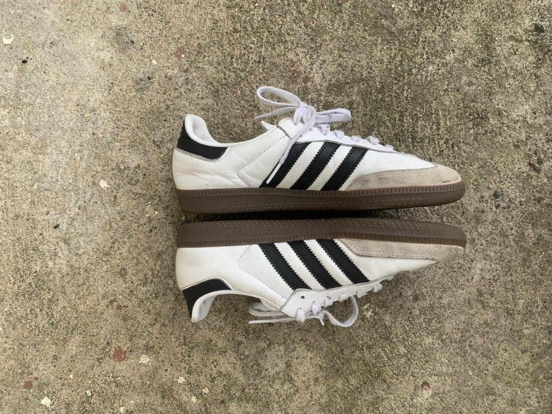 Adidas Samba OG White Black Gum (Category: Sneakers) located in Manila. Submitted by mattjalamanadoromal323 (Listing ID 1461521930, Image 2). Description: - Classic Adidas Samba OG sneakers - White leather with iconic black stripes - Durable gum sole - Perfect for everyday wear - Shows some signs of use on toe box and soles - Plenty of life remaining.