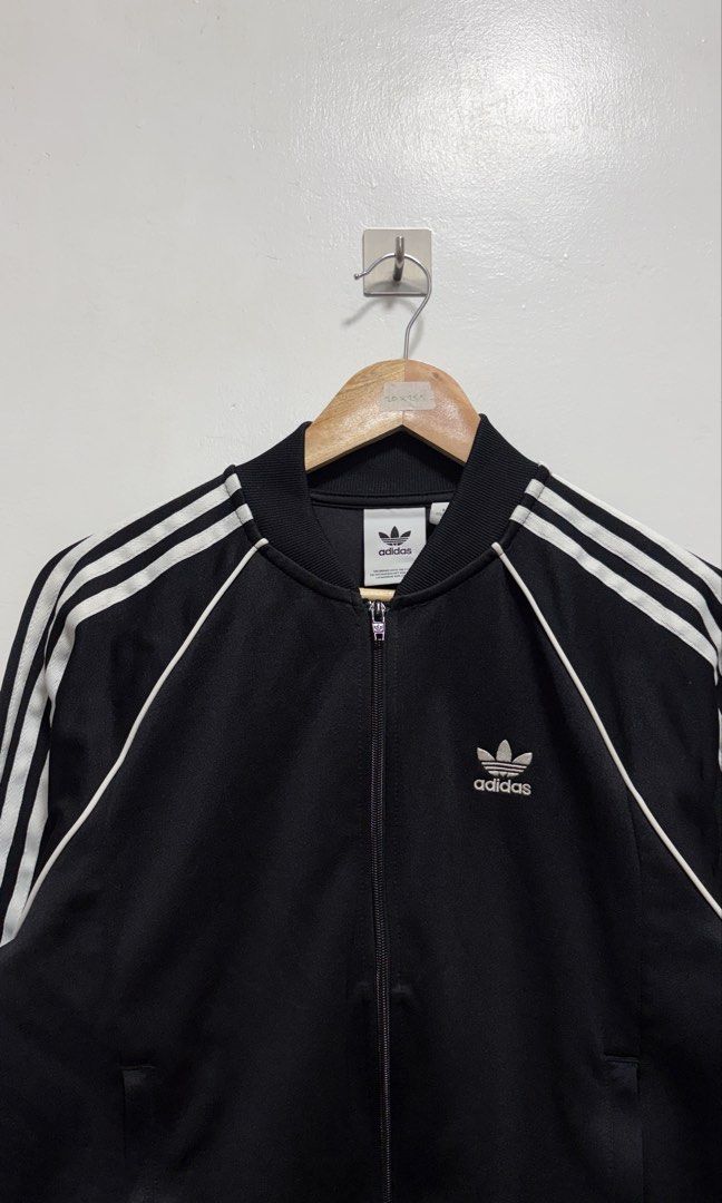 Adidas Superstar Black Track Jacket (Category: Coats, Jackets and Outerwear) located in Manila. Submitted by petlover777 (Listing ID 1461557994, Image 2). Description: Best fit to small to medium (20 x 25.5) GOOD AS NEW! NO ISSUE 📍Pick up location: Barangay 235 Hall Abad Santos Manila 🛵Delivery: J&t | Lalamove.