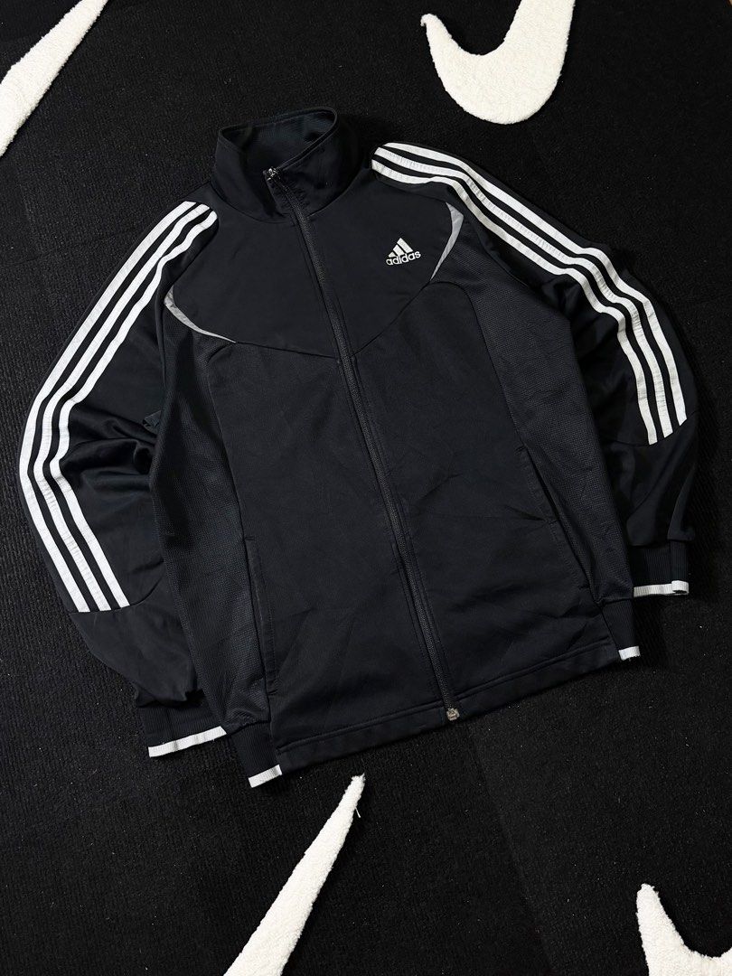 adidas track jacket (Category: Activewear) located in Manila. Submitted by styleandfly191238 (Listing ID 1461327424, Image 2). Description: length 27 width 22.5 issue none excllent condition complete tags and original color may vary due to light dm me for more inquiry mop g cash courier jnt or lalamove.