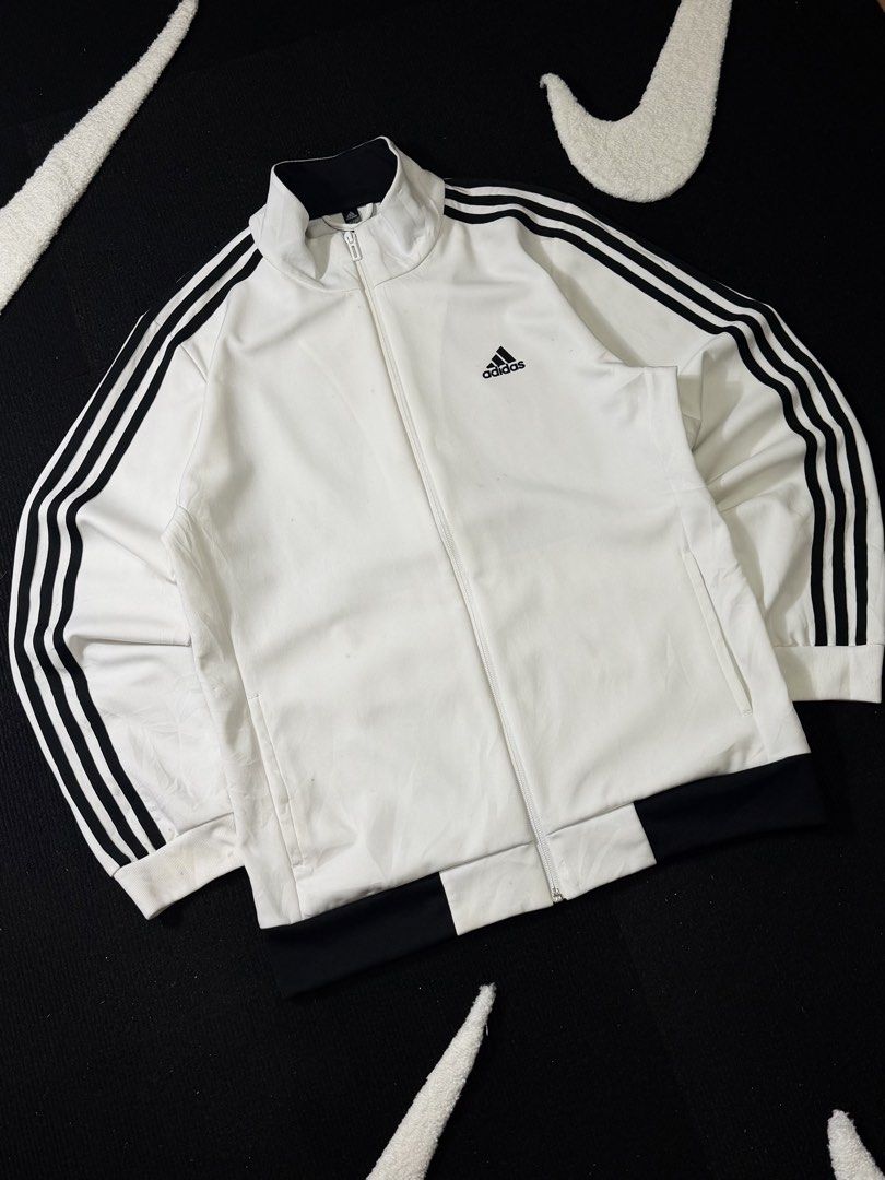adidas track jacket three stripe (Category: Activewear) located in Manila. Submitted by styleandfly191238 (Listing ID 1461327261, Image 2). Description: length 28 width 23.5 issue none excllent condition complete tags and original color may vary due to light dm me for more inquiry mop g cash courier jnt or lalamove.