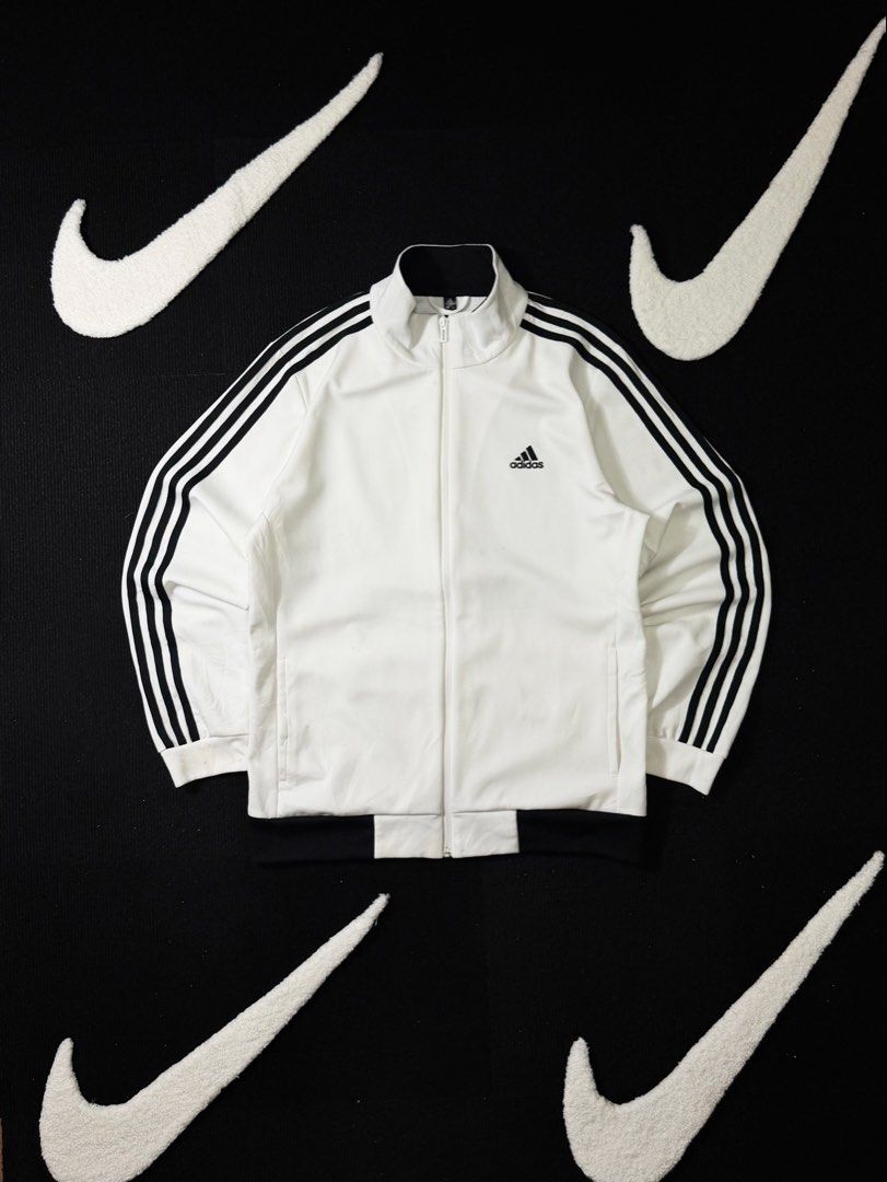 adidas track jacket three stripe (Category: Activewear) located in Manila. Submitted by styleandfly191238 (Listing ID 1461327261, Image 1). Description: length 28 width 23.5 issue none excllent condition complete tags and original color may vary due to light dm me for more inquiry mop g cash courier jnt or lalamove.
