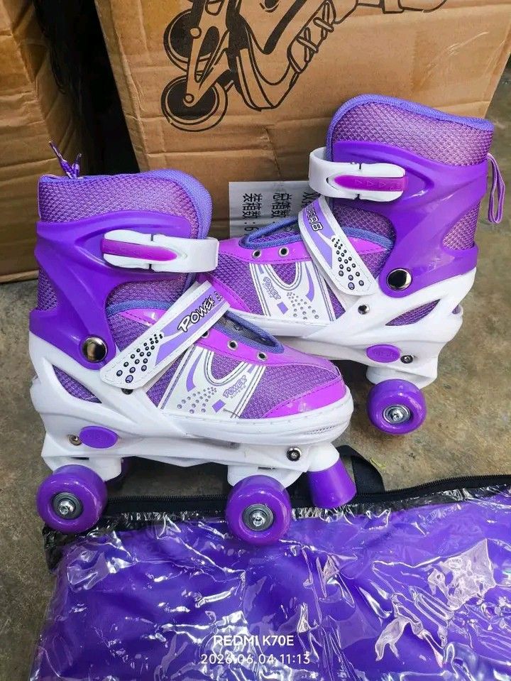 Adjustable Kids Roller Skates with Bag (Category: Babies & Kids Fashion) located in Manila. Submitted by berdenmarl01688 (Listing ID 1461327823, Image 1). Description: - Fun roller skates for kids! - Available colors: Purple, Black, Blue, Red, Pink - Adjustable straps for a secure fit - Wheels light up when rolling for extra fun! - Comes with a matching carry bag - Great for outdoor play and learning to skate.