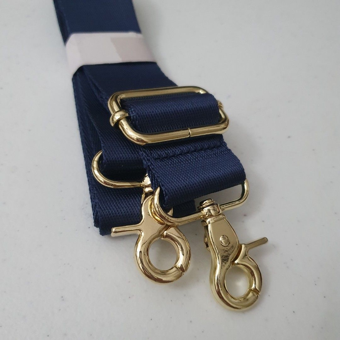 Adjustable Navy Blue Bag Strap with Gold Hardware (Category: Sling Bags) located in Paranaque City. Submitted by cobien (Listing ID 1461418534, Image 3). Description: - Navy blue adjustable bag strap - Features shiny gold hardware with secure swivel clasps - Made from durable, strong nylon material - Ideal for replacing worn-out straps or customizing your bag.