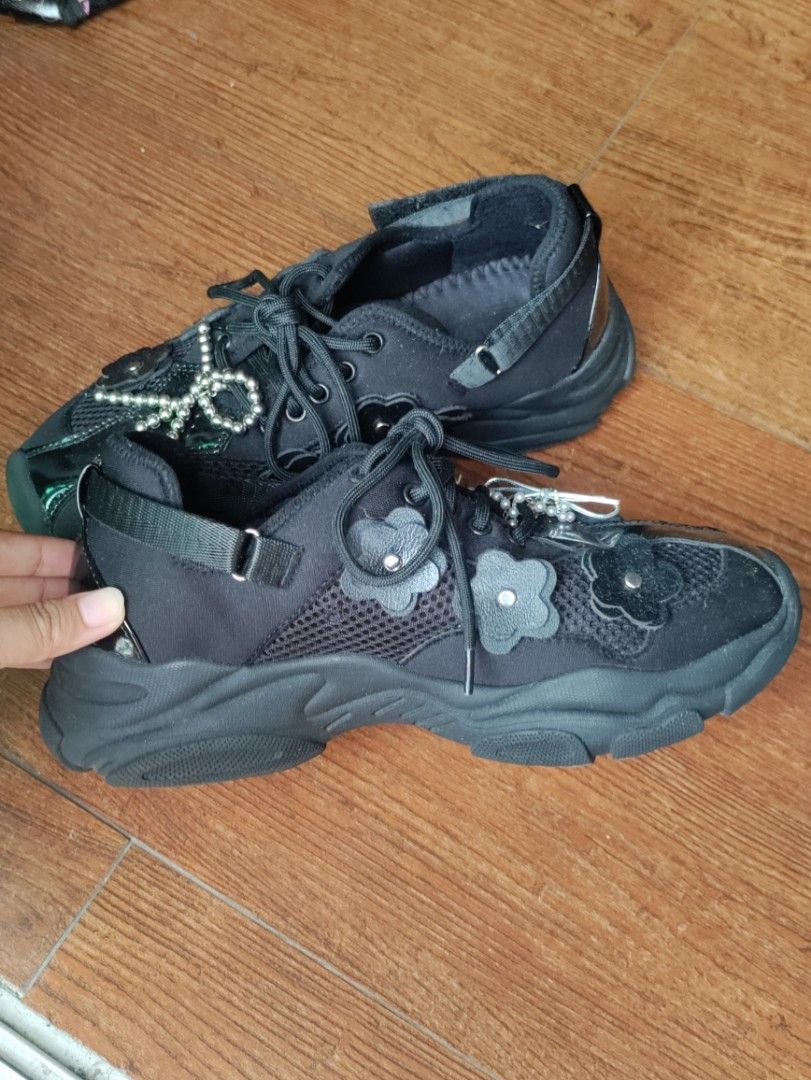 Adorable Projects Black Rochella Sneakers (Category: Sneakers) located in Las Pinas. Submitted by salamart (Listing ID 1461422039, Image 2). Description: ***size is for foot length that's 25cm*** - Black sneakers with whimsy flower details - Secure lace-up closure and velcro strap for ankles - Trendy chunky sole - Very fun to style with different socks and skirts - Comes with original BOX and free shoes accessories. Lightly used, got to walk arou