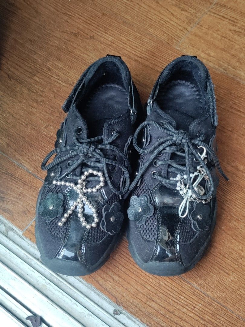 Adorable Projects Black Rochella Sneakers (Category: Sneakers) located in Las Pinas. Submitted by salamart (Listing ID 1461422039, Image 3). Description: ***size is for foot length that's 25cm*** - Black sneakers with whimsy flower details - Secure lace-up closure and velcro strap for ankles - Trendy chunky sole - Very fun to style with different socks and skirts - Comes with original BOX and free shoes accessories. Lightly used, got to walk arou