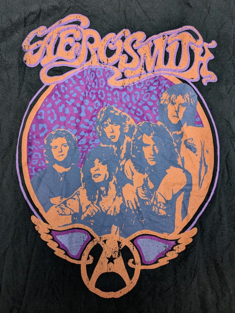 Aerosmith Band T-Shirt (Category: Tshirts & Polo Shirts ) located in Tubod. Submitted by the_prime1998 (Listing ID 1461351753, Image 2). Description: - Cool Aerosmith band t-shirt - Features classic band photo graphic - Dark green color - Estimated size: Medium (M/M) - Great for any Aerosmith fan!.