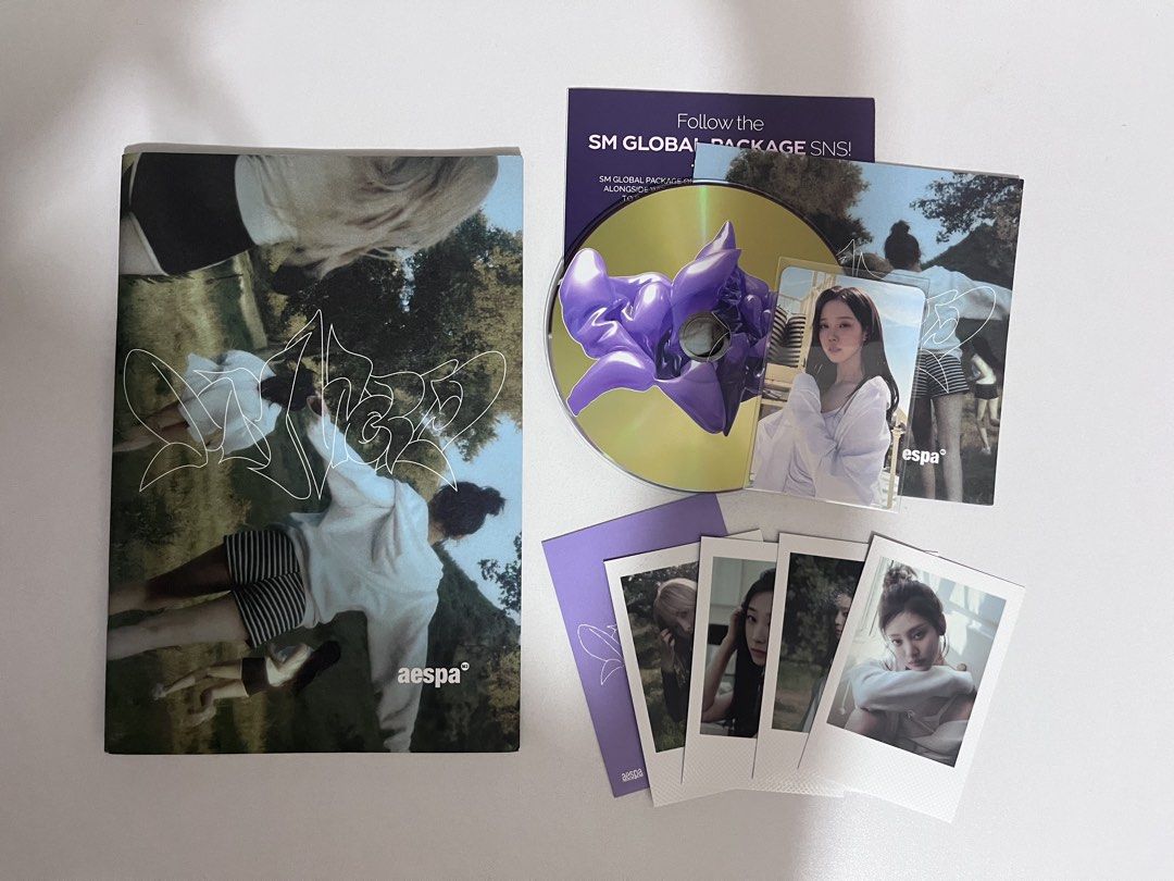 aespa SM Global Package CD and Photocards (Category: CDs & DVDs) located in Angeles City. Submitted by kiecollects (Listing ID 1461524904, Image 1). Description: loc: pampanga mod: jnt or meetup at sm clark mop: gcash - Official aespa SM Global Package - Includes CD - Photobook included - Several photocards - Some polaroid-style inclusions - Great for any MY! - All items are authentic SM Global Package inclusions - Please check photos for detaile