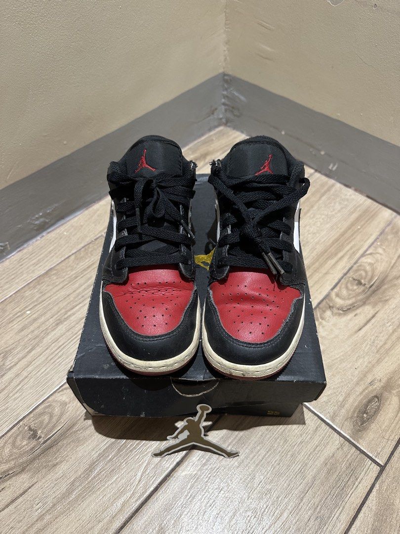 Air Jordan 1 Low (GS) Sneakers (Category: Sneakers) located in Manila. Submitted by sircee6 (Listing ID 1461364655, Image 3). Description: - Air Jordan 1 Low (GS) - Colorway: Black, White, and Red - Size: 5Y (Youth) - Includes original box - Perfect for everyday wear.