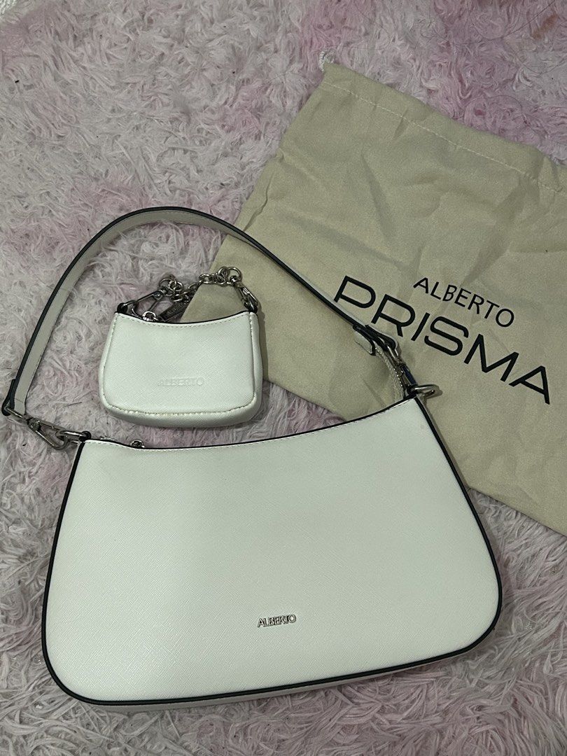 ALBERTO PRISMA Raylan Shoulder Bag (white) (Category: Shoulder Bags) located in Roxas City. Submitted by faithlyaen (Listing ID 1461456259, Image 1). Description: - white ALBERTO PRISMA shoulder bag - includes matching mini pouch - with minimal stains (dm for pictures) - price is negotiable .