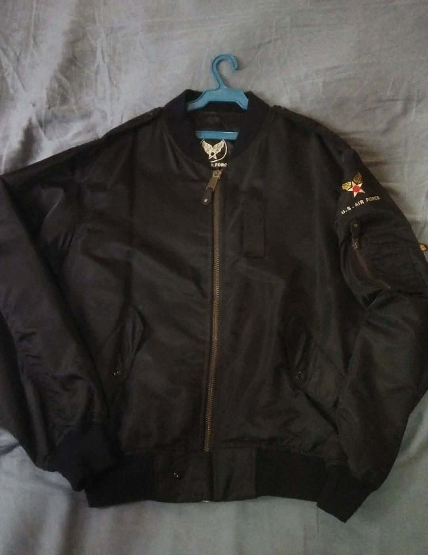 Alpha Industries U.S. Air Force MA-1 Bomber Jacket (Category: Coats, Jackets and Outerwear) located in Caloocan City. Submitted by onethriftjel (Listing ID 1461371847, Image 1). Description: - Classic black U.S. Air Force bomber jacket - Features iconic U.S. Air Force patches on chest and sleeve - Zippered sleeve pocket with pen slots - Inner lining visible in photos - Ideal for everyday wear.