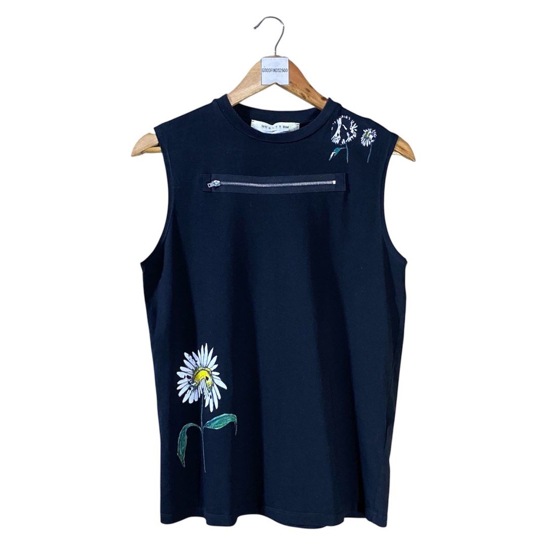 Alyx Daisy Zipper Tanktop (Category: Luxury Apparel) located in Baguio. Submitted by goodfinds2600v2 (Listing ID 1461493700, Image 1). Description: Size on tag: S fits S-M Dimensions: L-26 W/Bust-18.5 Description: unisex, 8.5-9/10 color rate Condition: Very good Issue/s: melted and peeled print .
