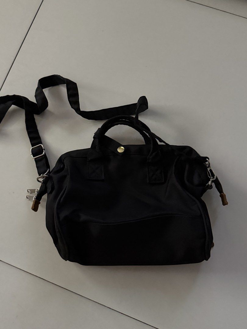 Anello 2-way Bag Black (Category: Cross-body Bags) located in Manila. Submitted by hatdognablue (Listing ID 1461360880, Image 2). Description: - Anello bag in classic black - Versatile: can be used as a handbag or shoulder bag - Features a convenient front zip pocket - Includes internal compartments for organization - Zippers are smooth and functional - Minor signs of wear on leather zipper pulls - Interior is clean and well-maintained.