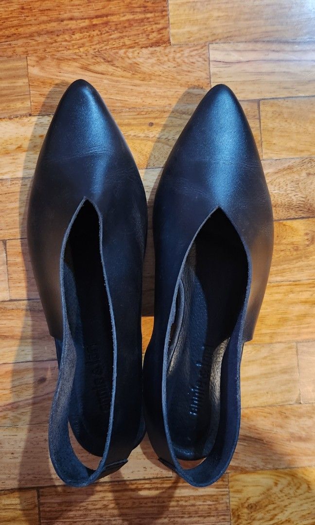 Annie & Lori Black Pointed Shoes Size 7 (Category: Flats & Sandals) located in Makati City. Submitted by mominmid40s (Listing ID 1461483853, Image 1). Description: Achieve a polished, chic look with the Bella shoes. These pointed toe leather shoes feature a half-closed sling-back strap, ideal for a stylish transition from nine to five and beyond. Rfs too many black shoes. have same style in beige which i use more often!.
