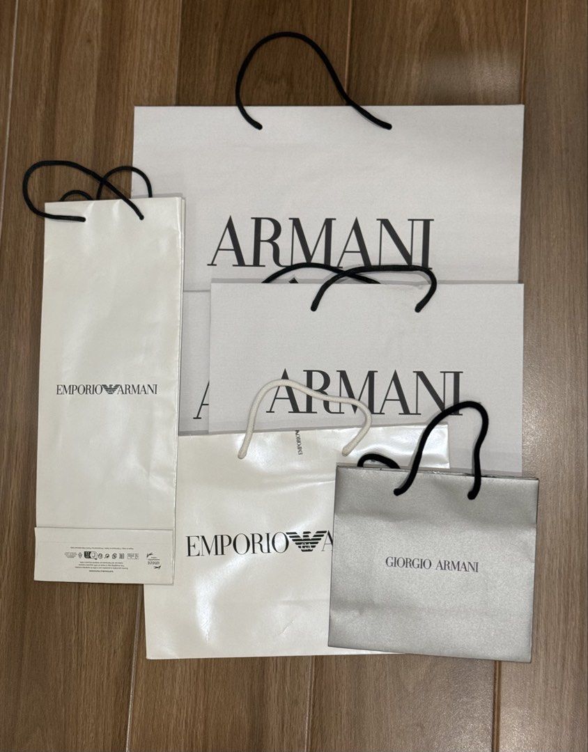Armani Shopping Bags - Various Sizes (Category: Luxury Bags & Wallets) located in Cavite. Submitted by mjoy0302md (Listing ID 1461425381, Image 1). Description: - Bundle includes both Emporio Armani and Giorgio Armani shopping bags. - Ideal for gifting or organizing your belongings. - Assorted sizes available to suit your needs (lot of 6 pcs, different sizes).