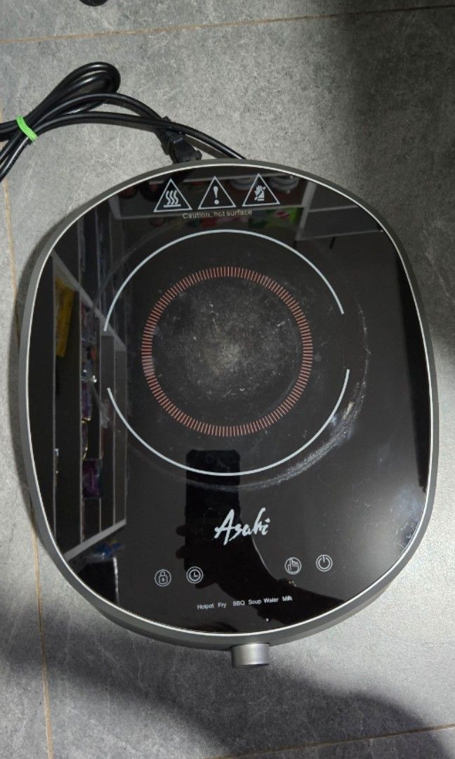 Asahi Induction Cooker (Category: Cookers) located in Manila. Submitted by kwaween (Listing ID 1461542422, Image 1). Description: - Asahi Induction Cooker - Tempered Glass top - Versatile cooking functions: Hotpot, Fry, Soup, Water/Milk - Minor cosmetic scuffs from normal use - Fully functional and works well - Power cord included.