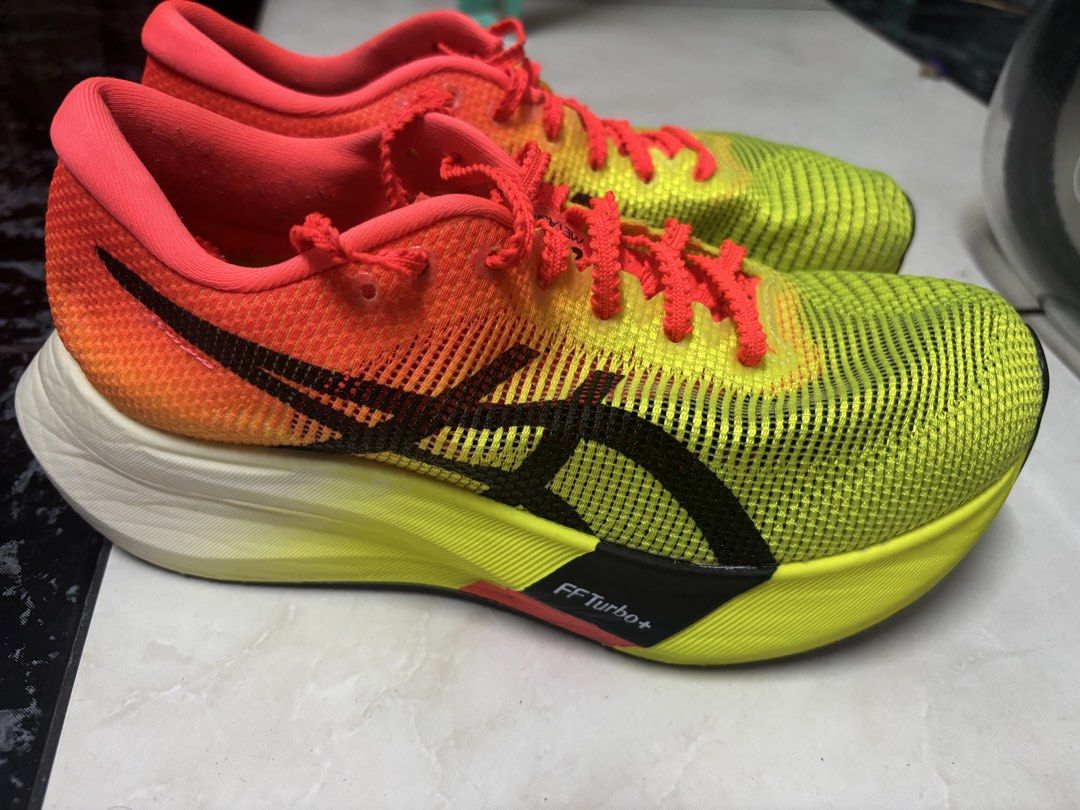 ASICS Metaspeed Edge (Category: Sneakers) located in Pasay City. Submitted by alrt.idle (Listing ID 1461365201, Image 1). Description: - ASICS Metaspeed Edge+ running shoes - Vibrant yellow and orange colorway - Lightweight and breathable mesh upper - Engineered for speed and peak performance - Features advanced FF Turbo+ cushioning - Ideal for race day and intense training sessions.